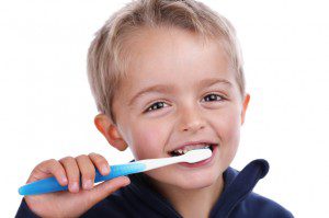 child brushing teeth