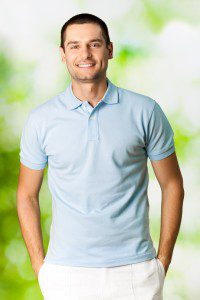 Portrait of young attractive smiling man, outdoors