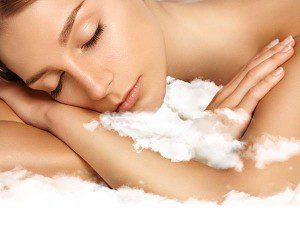 beauty woman with ideal skin sleaping on a cloud